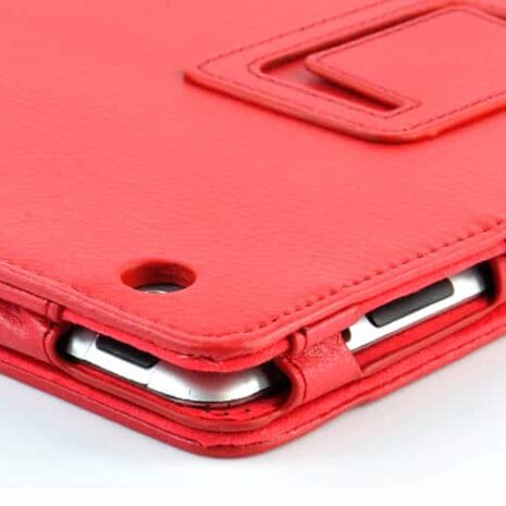 a red leather case with a phone in it