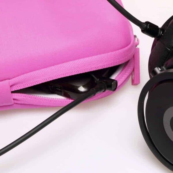 a pink case with headphones in it