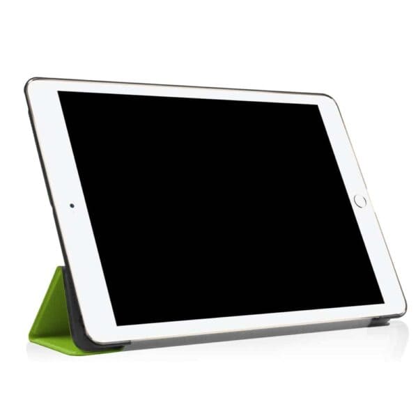 a white tablet with a green cover