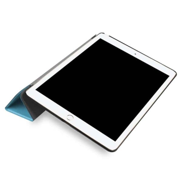 a white tablet with a blue cover