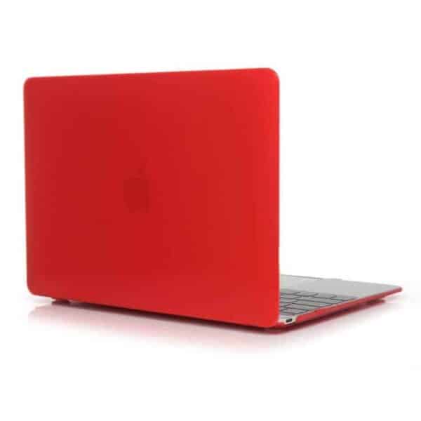 a red laptop with a keyboard