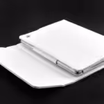 a white tablet case with a phone in it