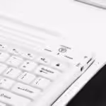 a white keyboard with buttons