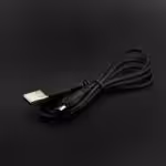 a black usb cable on a black background