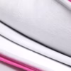 a close-up of a pink and white pillow